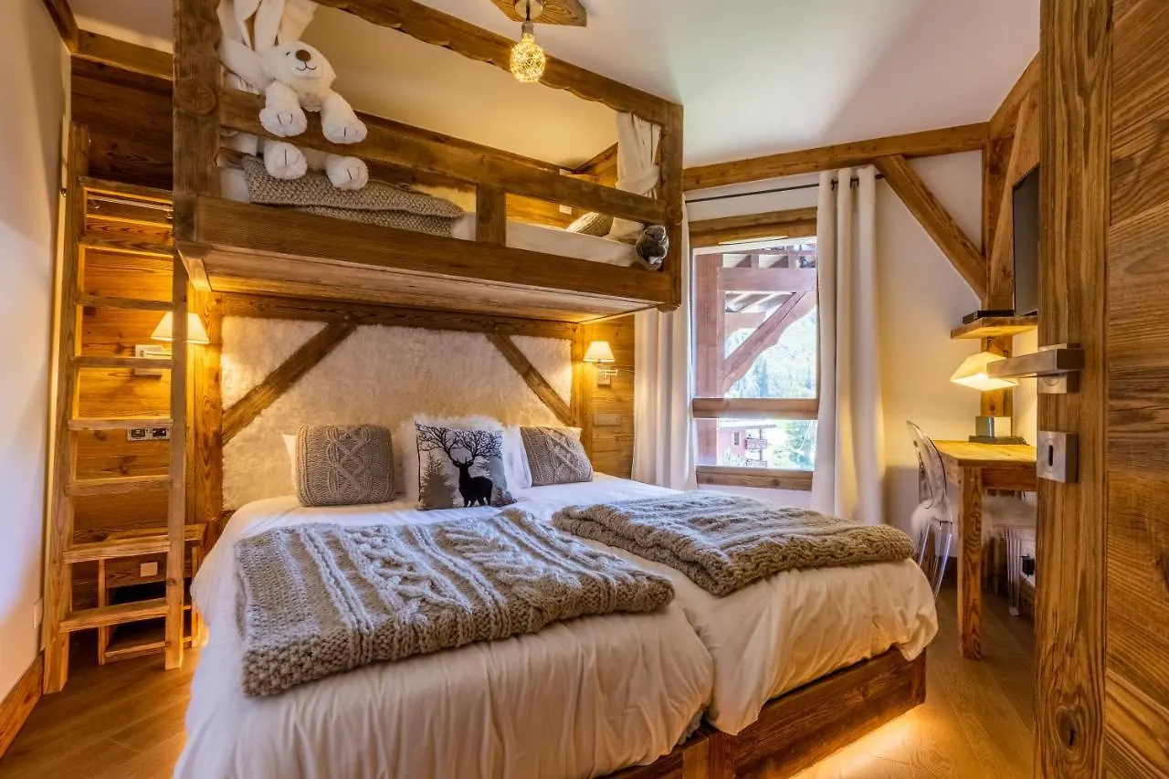 Appartement Arc 1950, ambiance chalet luxe 5/7pers dans résidence 5* skis aux pieds avec SPA Les Arcs